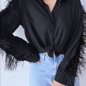 this beautiful blouse with feather on the sleeves is very fashionable 2022 🪶